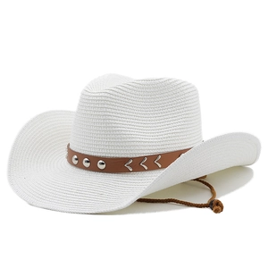 Detail of white straw cowboy hat with brown faux leather band and metallic V-shaped studs