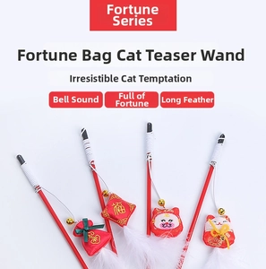 Chinese New Year cat wand teaser set with red festive charms and long white feathers