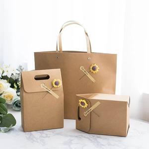 Brown kraft paper gift box set with sunflower decoration and 'Especially for you' tag