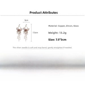 Detailed view of butterfly tassel earrings with copper base, zircon, and glass beads