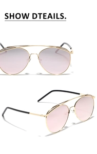 Detail view of double bridge metal aviator sunglasses with pink gradient lenses