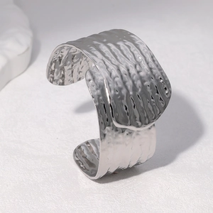 Minimalist hammered stainless steel cuff bracelet with silver ripple texture finish
