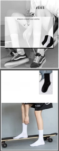 Detail of ribbed cuffs on breathable white and black mid-calf cotton sports socks