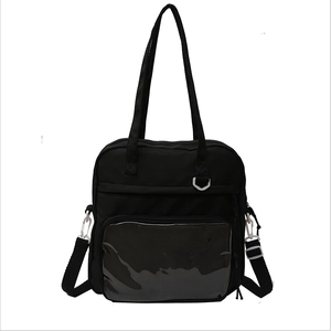 Large capacity black nylon tote bag with clear front pocket and adjustable shoulder strap