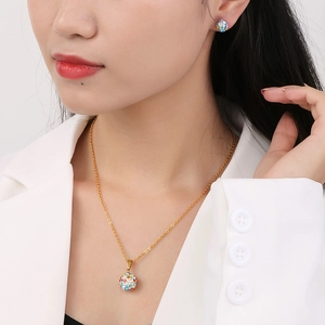 Elegant gold titanium steel jewelry set with colorful zircon pavé ball pendant and earrings