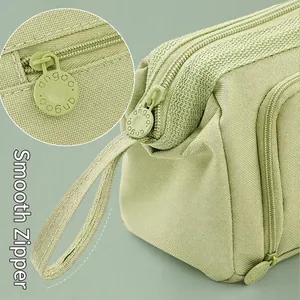 Large capacity sage green canvas pencil case with multiple layers and a portable handle