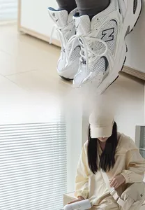 Detail of retro mesh sneakers and matching beige embroidered cap with canvas bag