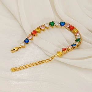 Detail of colorful heart zircon tennis bracelet with gold stainless steel lobster clasp