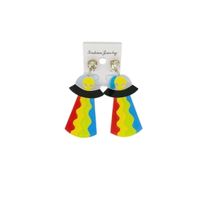 Detailed shot of colorful UFO and alien earrings with vibrant acrylic and rhinestone accents
