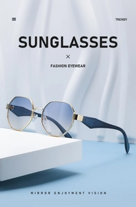Detail of hexagonal gold metal sunglasses featuring stylish blue gradient lenses