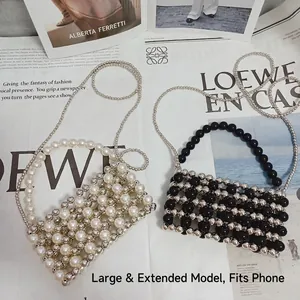 Silver beaded mini bag with pearls and crossbody chain strap shown in a flat lay setup