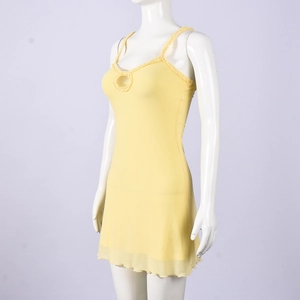 Detail of light yellow mesh mini dress with ruffle straps and cutout chest design