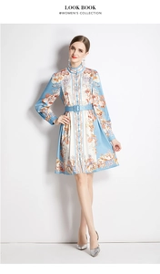 Detail of light blue floral dress showing mandarin collar, buttons, and matching belt