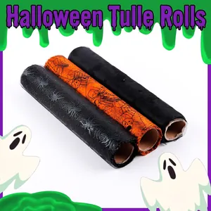 Halloween decorative tulle rolls featuring black spiders and orange cobweb skull patterns