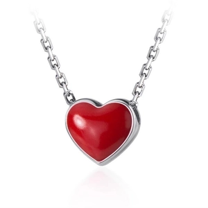 Minimalist red heart pendant necklace with silver link chain on white background