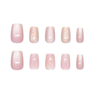 Pink gradient cat eye press-on nails with marble texture and golden minimalist accents