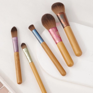5-piece mini makeup brush set with wooden handles and colorful floral metal ferrules
