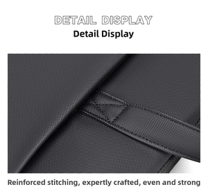 Macro shot of waterproof laptop bag featuring reinforced X-shaped stitching and diamond texture