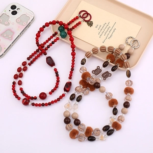 Handmade acrylic beaded phone charms with cute cartoon bears and colorful tassels