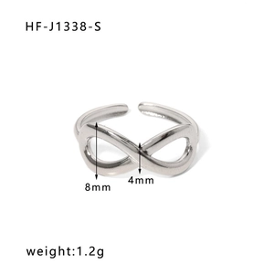 Macro shot of silver infinity symbol ring showing dimensions of 8mm width and 4mm thickness