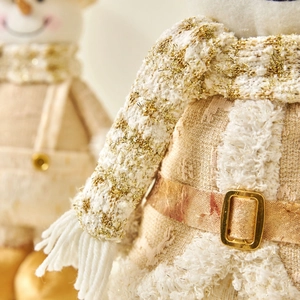 Christmas snowman dolls with telescopic legs featuring gold knitted scarves and faux fur trim