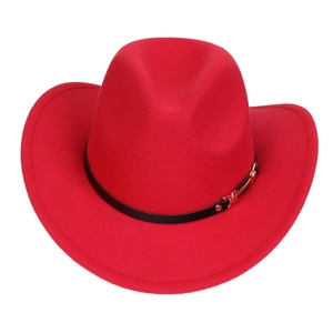Detailed close-up of a red felt cowboy hat featuring a black leather band and gold buckle