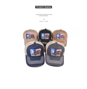 Detailed grid showing five colors of mesh trucker hats with truck embroidery patches