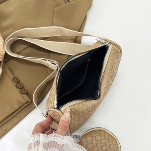Fashionable khaki woven bucket bag with matching round purse and adjustable shoulder strap