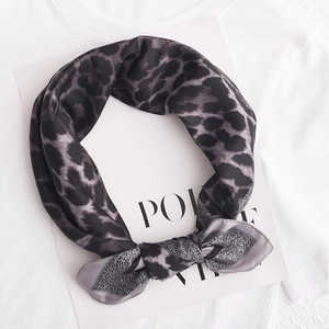 Classic leopard print silk square scarf in dark grey and black with geometric border