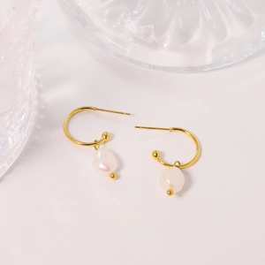 Elegant C-shaped gold stainless steel earrings with white baroque freshwater pearls