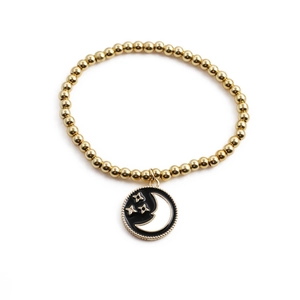 Bracelet à perles dorées avec pendentif en émail noir orné de lune et d'étoiles