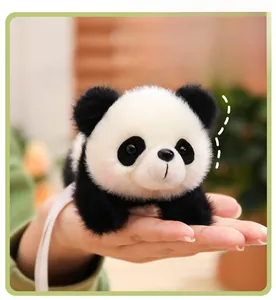 Plush panda keychain accessory with soft black and white fur and pink cheek detail