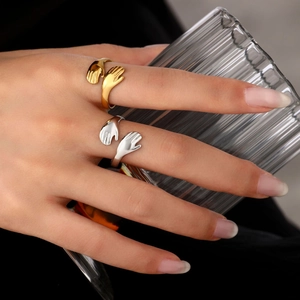 Polished hugging hands open rings in gold and silver finish for couples and lovers