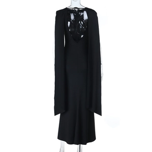 Detailed back view of a black floor-length evening dress with a deep V-back and long cape sleeves