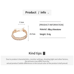 Detailed macro view of gold-tone alloy rhinestone Cuban link bracelet with 8.4g weight