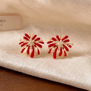 Vintage style red firework stud earrings with silver needles and sparkling crystals