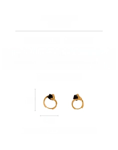 Detail view of irregular gold cube hoop earrings featuring black zircon stones and measurements