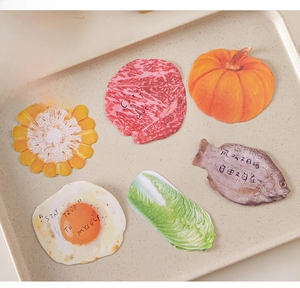 Creative 3D food-shaped sticky notes featuring realistic corn, egg, and meat designs