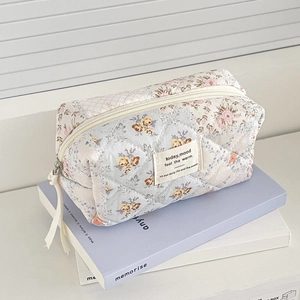 Quilted floral makeup bag with light blue pattern and large capacity for travel
