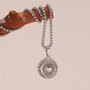 Silver stainless steel box chain necklace with sun and crescent moon pendant on a branch