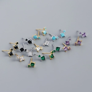 Detailed close-up of geometric square zircon earrings in various vibrant colors