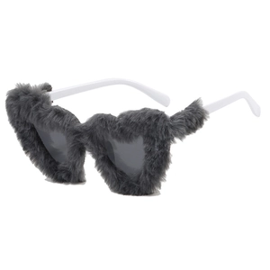 Retro heart-shaped sunglasses with dark gray faux fur trim and white temples