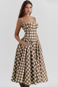 Detail of French vintage plaid sundress featuring a corset waist and side pockets