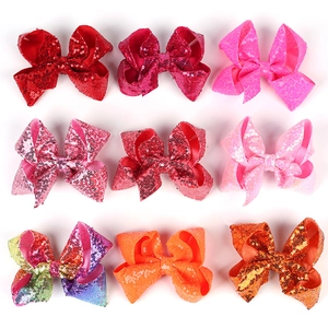Detailed set of 9 colorful 5-inch sequin hair bows for girls in various vibrant shades
