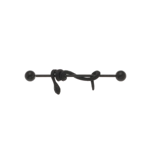 Macro detail of black industrial barbell piercing featuring a textured snake design
