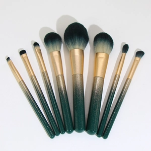 8-piece green gradient makeup brush set with glitter handles for professional beauty looks