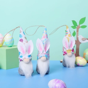 Detailed trio of Easter gnome plushies with bunny ears and pastel patterned hats