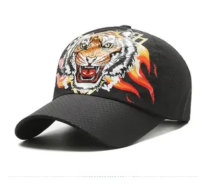 Detail view of quick-dry black mesh cap with colorful tiger head print and vent holes