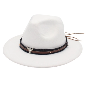 Close-up of white wool fedora with woven leather band and silver bull skull metal accent
