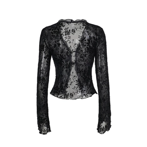 Detail of floral black lace chiffon top with flared sleeves and scalloped edges
